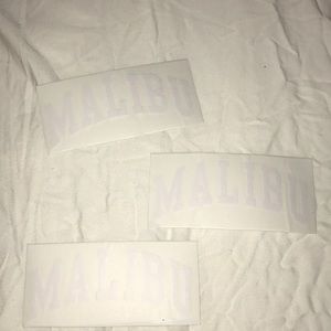 TWO peel off stickers